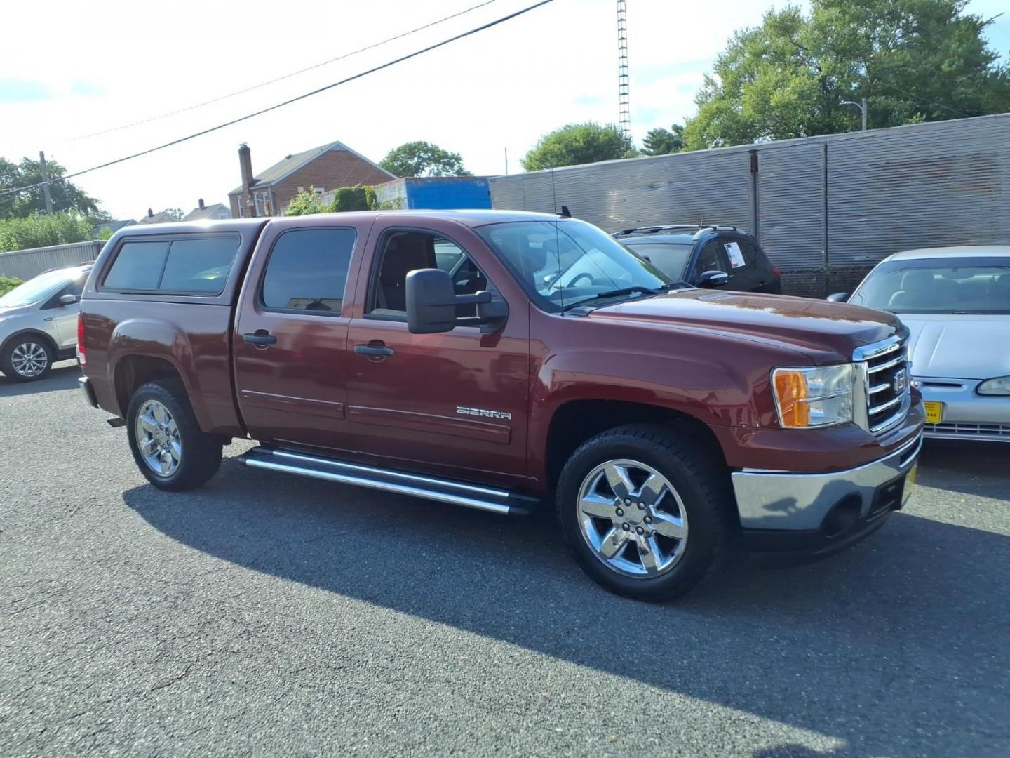 2013 Sonoma Red Metallic GMC Sierra 1500 SLE (3GTP1VE03DG) with an 5.3L 8 Cylinder Sequential-Port F.I. engine, Automatic transmission, located at 50 Eastern Blvd., Essex, MD, 21221, (410) 686-3444, 39.304367, -76.484947- Photo#6