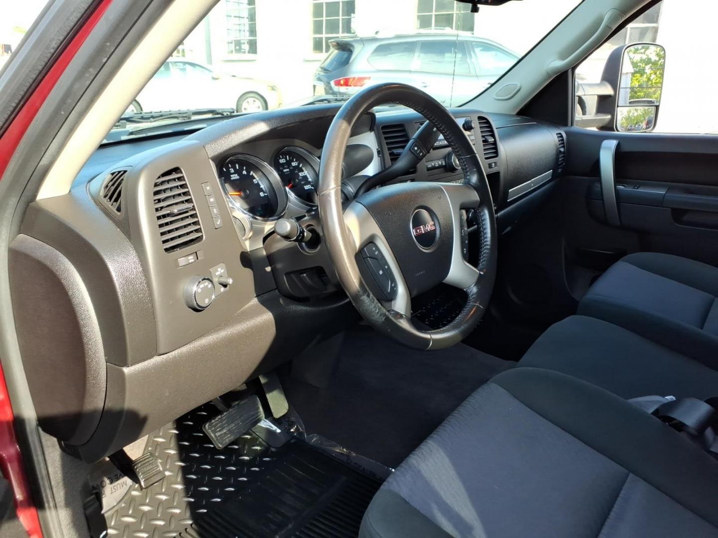 2013 Sonoma Red Metallic GMC Sierra 1500 SLE (3GTP1VE03DG) with an 5.3L 8 Cylinder Sequential-Port F.I. engine, Automatic transmission, located at 50 Eastern Blvd., Essex, MD, 21221, (410) 686-3444, 39.304367, -76.484947- Photo#8