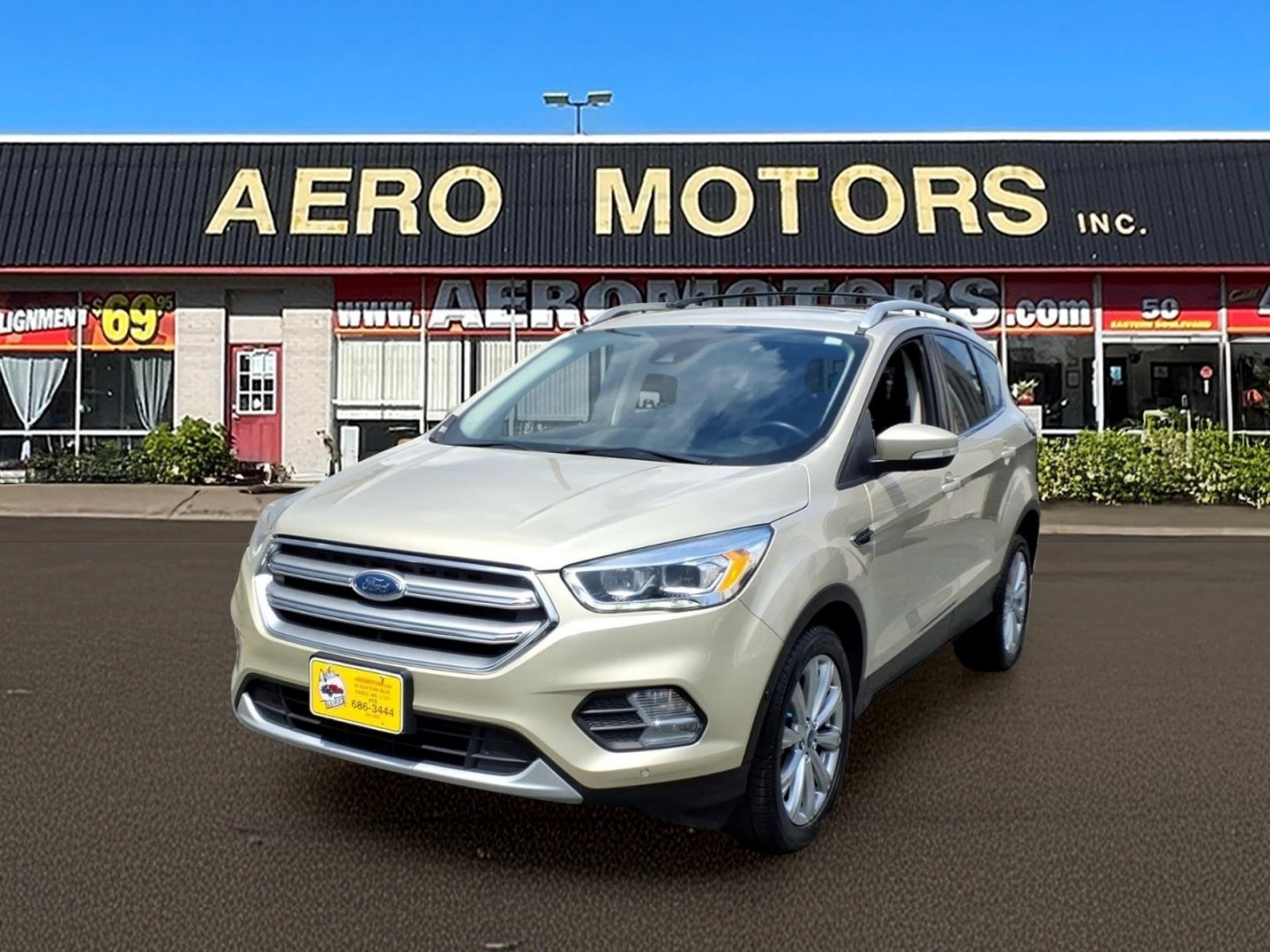 2017 White Gold Ford Escape Titanium (1FMCU9J95HU) with an 2.0L 4 Cylinder Turbocharged engine, ATAWD transmission, located at 50 Eastern Blvd., Essex, MD, 21221, (410) 686-3444, 39.304367, -76.484947- Photo#0