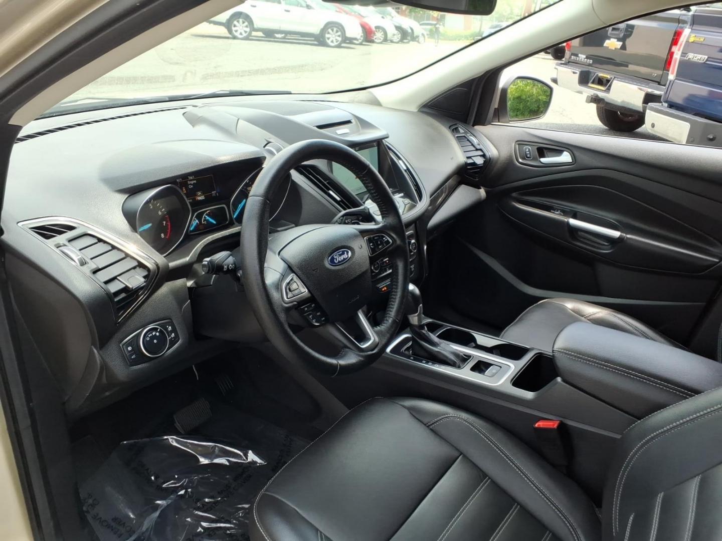 2017 White Gold Ford Escape Titanium (1FMCU9J95HU) with an 2.0L 4 Cylinder Turbocharged engine, ATAWD transmission, located at 50 Eastern Blvd., Essex, MD, 21221, (410) 686-3444, 39.304367, -76.484947- Photo#8