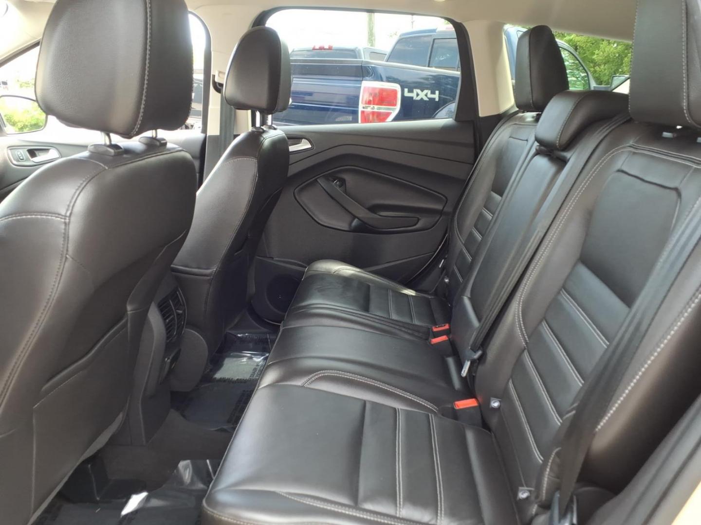 2017 White Gold Ford Escape Titanium (1FMCU9J95HU) with an 2.0L 4 Cylinder Turbocharged engine, ATAWD transmission, located at 50 Eastern Blvd., Essex, MD, 21221, (410) 686-3444, 39.304367, -76.484947- Photo#11