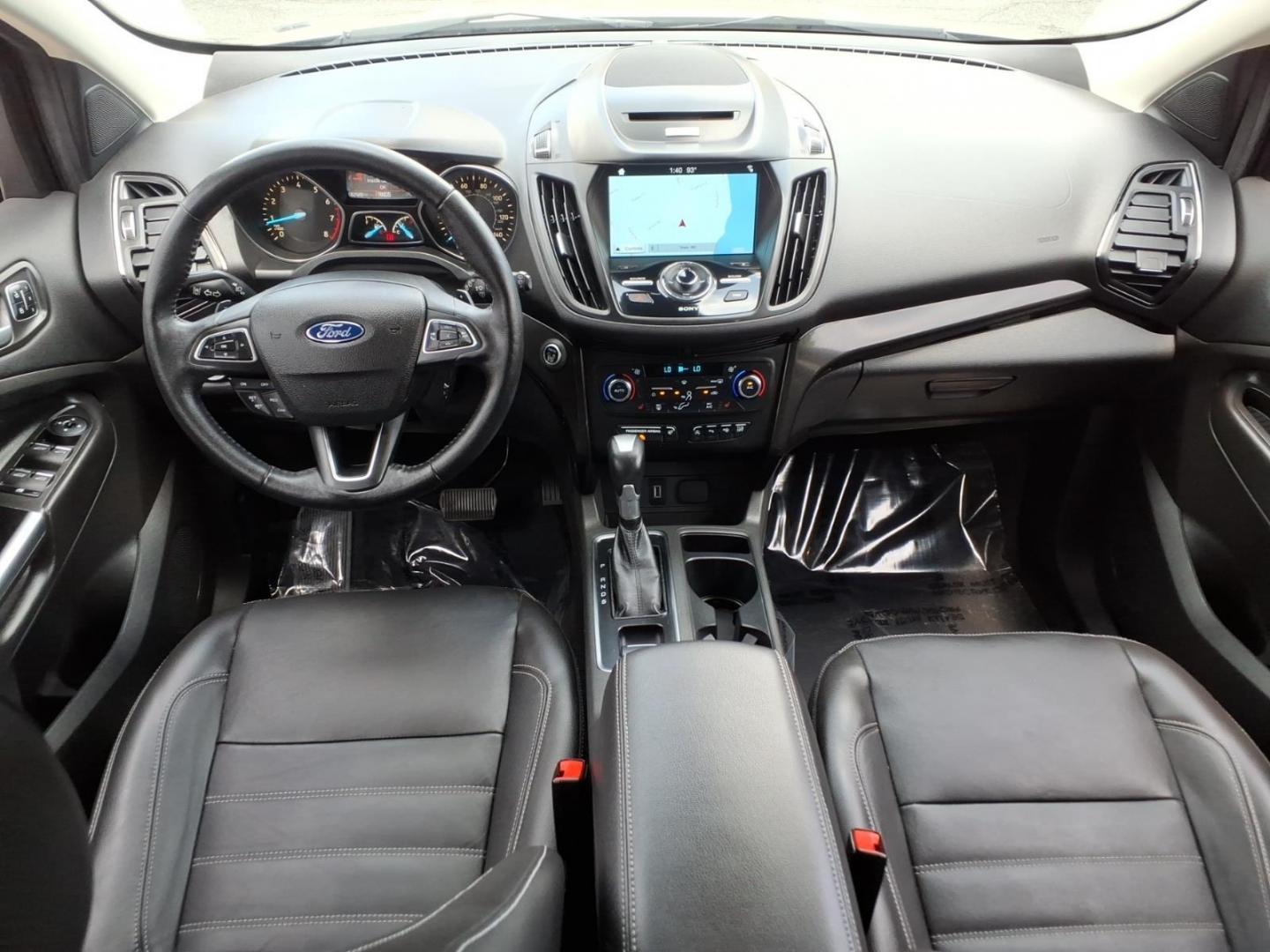 2017 White Gold Ford Escape Titanium (1FMCU9J95HU) with an 2.0L 4 Cylinder Turbocharged engine, ATAWD transmission, located at 50 Eastern Blvd., Essex, MD, 21221, (410) 686-3444, 39.304367, -76.484947- Photo#12