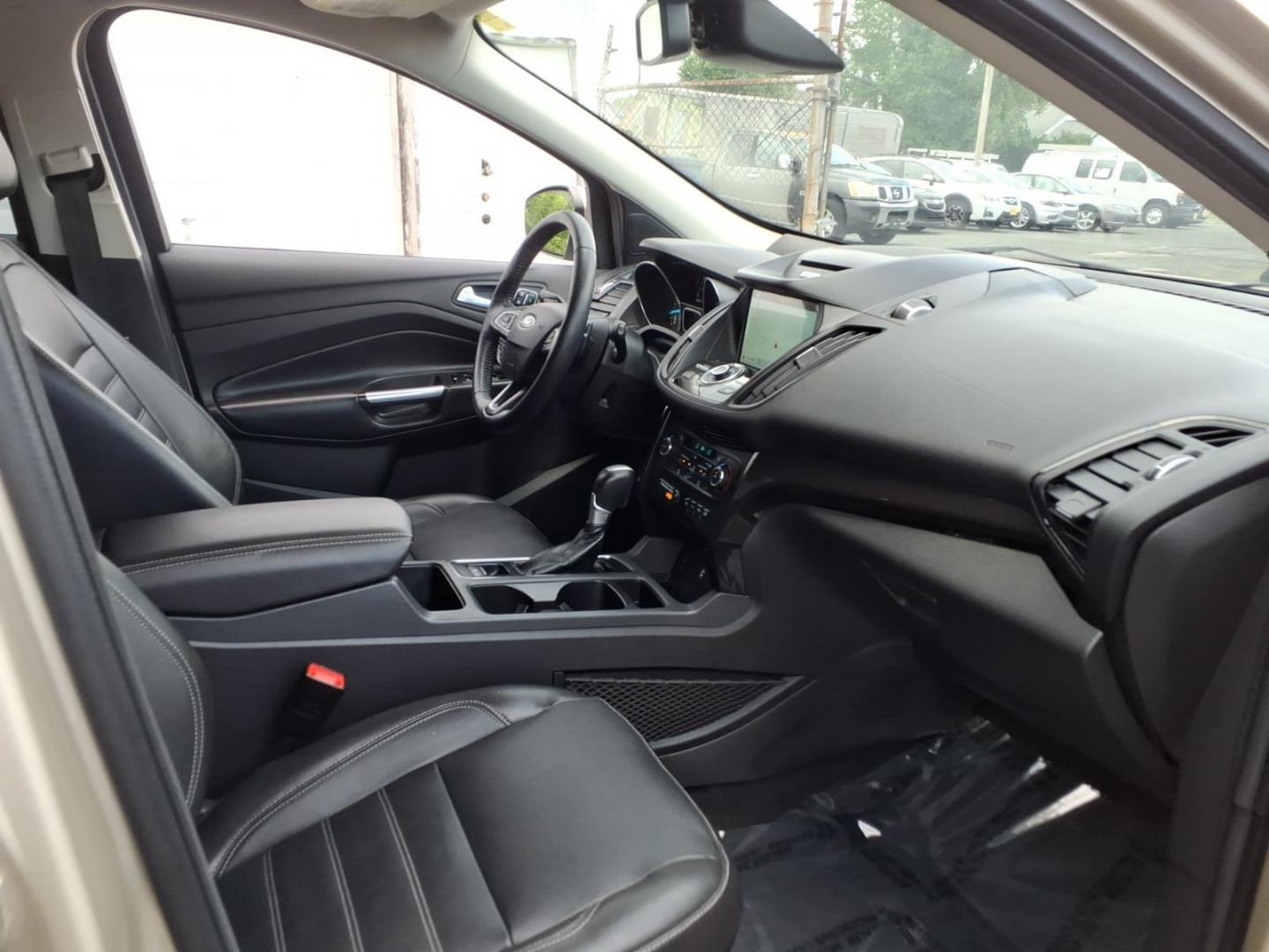 2017 White Gold Ford Escape Titanium (1FMCU9J95HU) with an 2.0L 4 Cylinder Turbocharged engine, ATAWD transmission, located at 50 Eastern Blvd., Essex, MD, 21221, (410) 686-3444, 39.304367, -76.484947- Photo#14