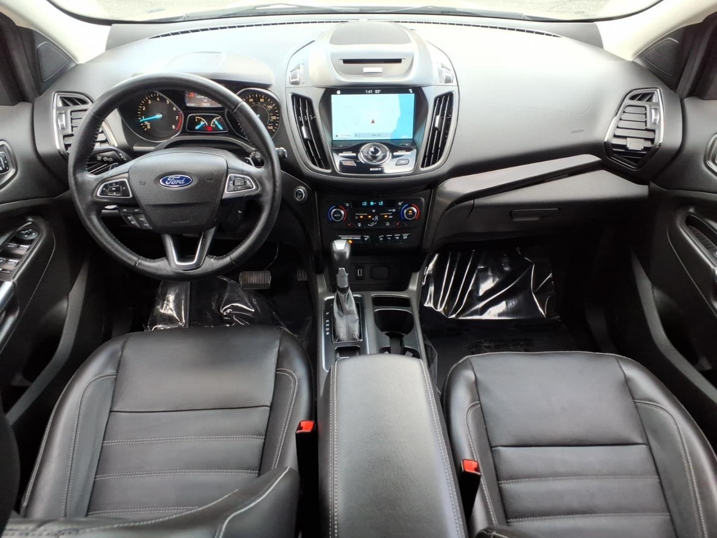 2017 White Gold Ford Escape Titanium (1FMCU9J95HU) with an 2.0L 4 Cylinder Turbocharged engine, ATAWD transmission, located at 50 Eastern Blvd., Essex, MD, 21221, (410) 686-3444, 39.304367, -76.484947- Photo#16