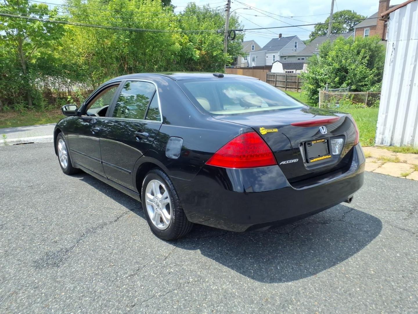 2007 Black Honda Accord EX-L (1HGCM56837A) with an 2.4L 2.4L inline 4 double overhead camshaft 16V Sequential-Port F.I. engine, 5-Speed Automatic transmission, located at 50 Eastern Blvd., Essex, MD, 21221, (410) 686-3444, 39.304367, -76.484947- Photo#2