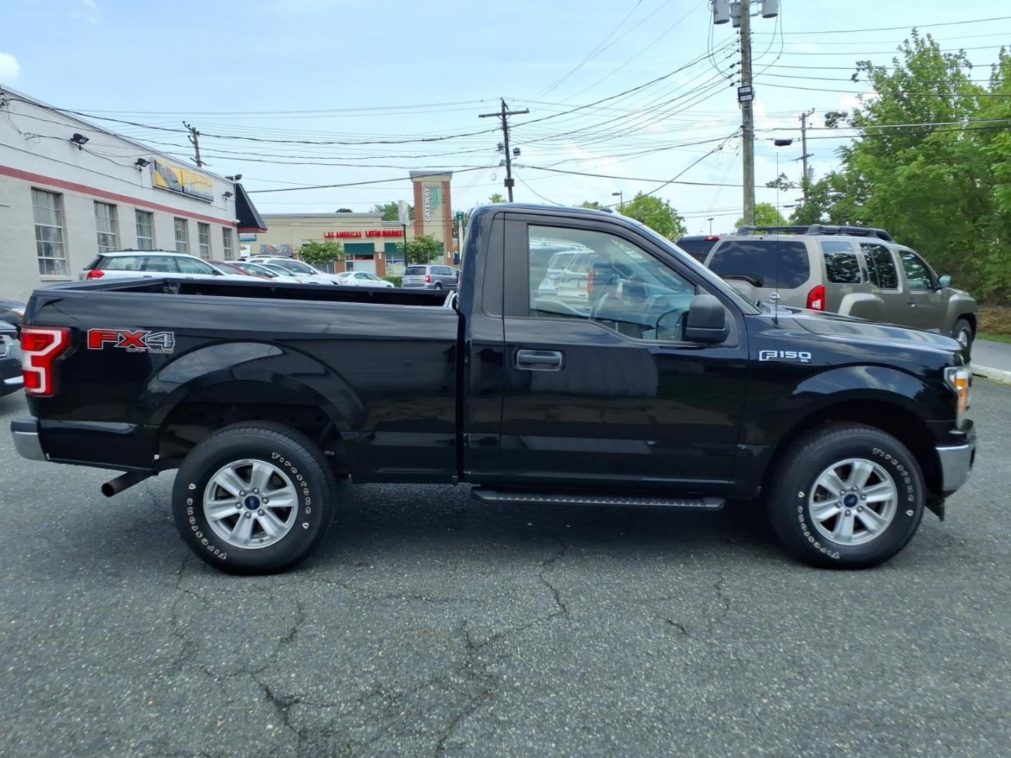 2018 Black Ford F-150 (1FTMF1E59JF) with an 5.0L 8 Cylinder Fuel Injected engine, AT4WD transmission, located at 50 Eastern Blvd., Essex, MD, 21221, (410) 686-3444, 39.304367, -76.484947- Photo#5