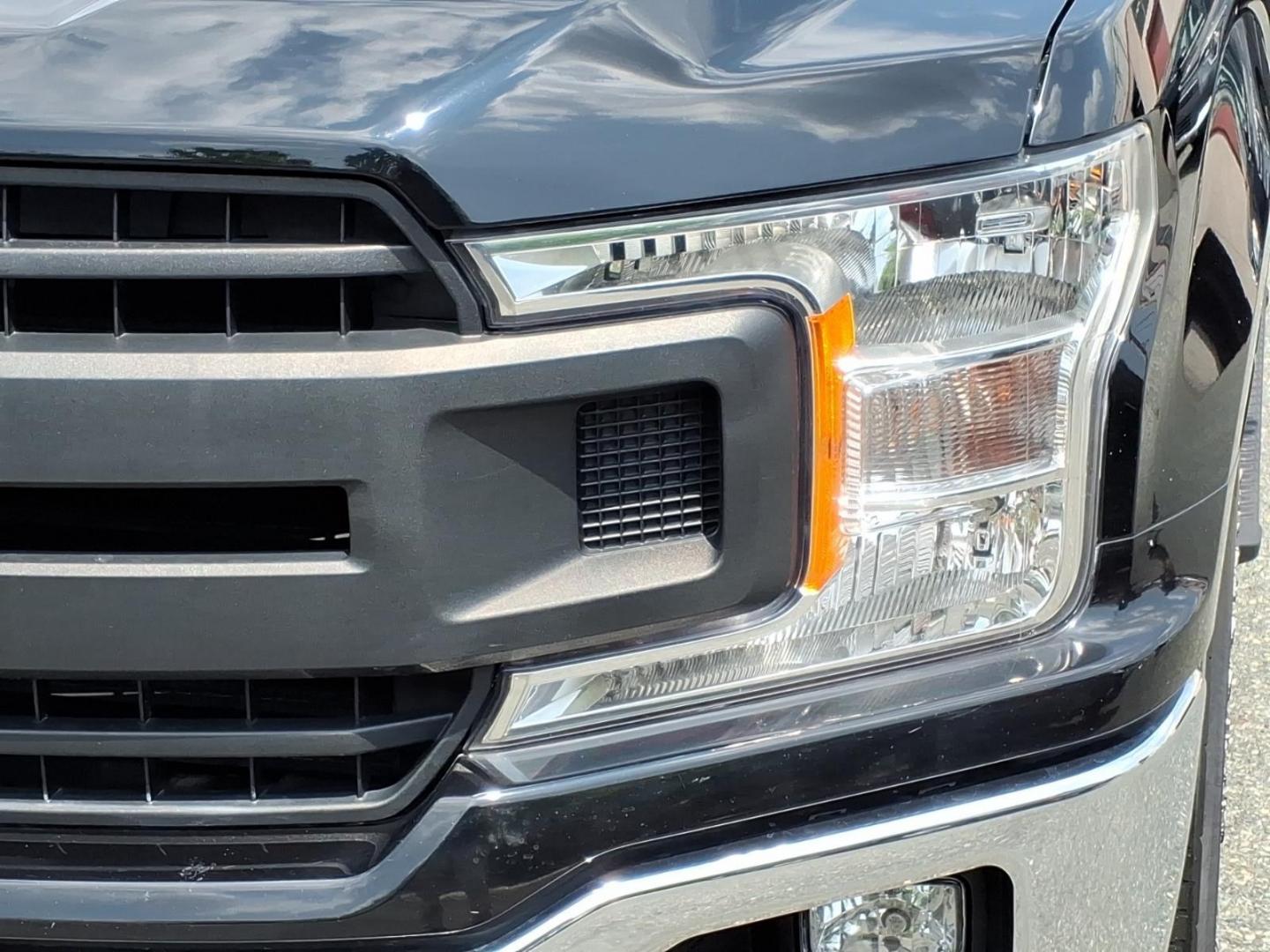 2018 Black Ford F-150 (1FTMF1E59JF) with an 5.0L 8 Cylinder Fuel Injected engine, AT4WD transmission, located at 50 Eastern Blvd., Essex, MD, 21221, (410) 686-3444, 39.304367, -76.484947- Photo#19