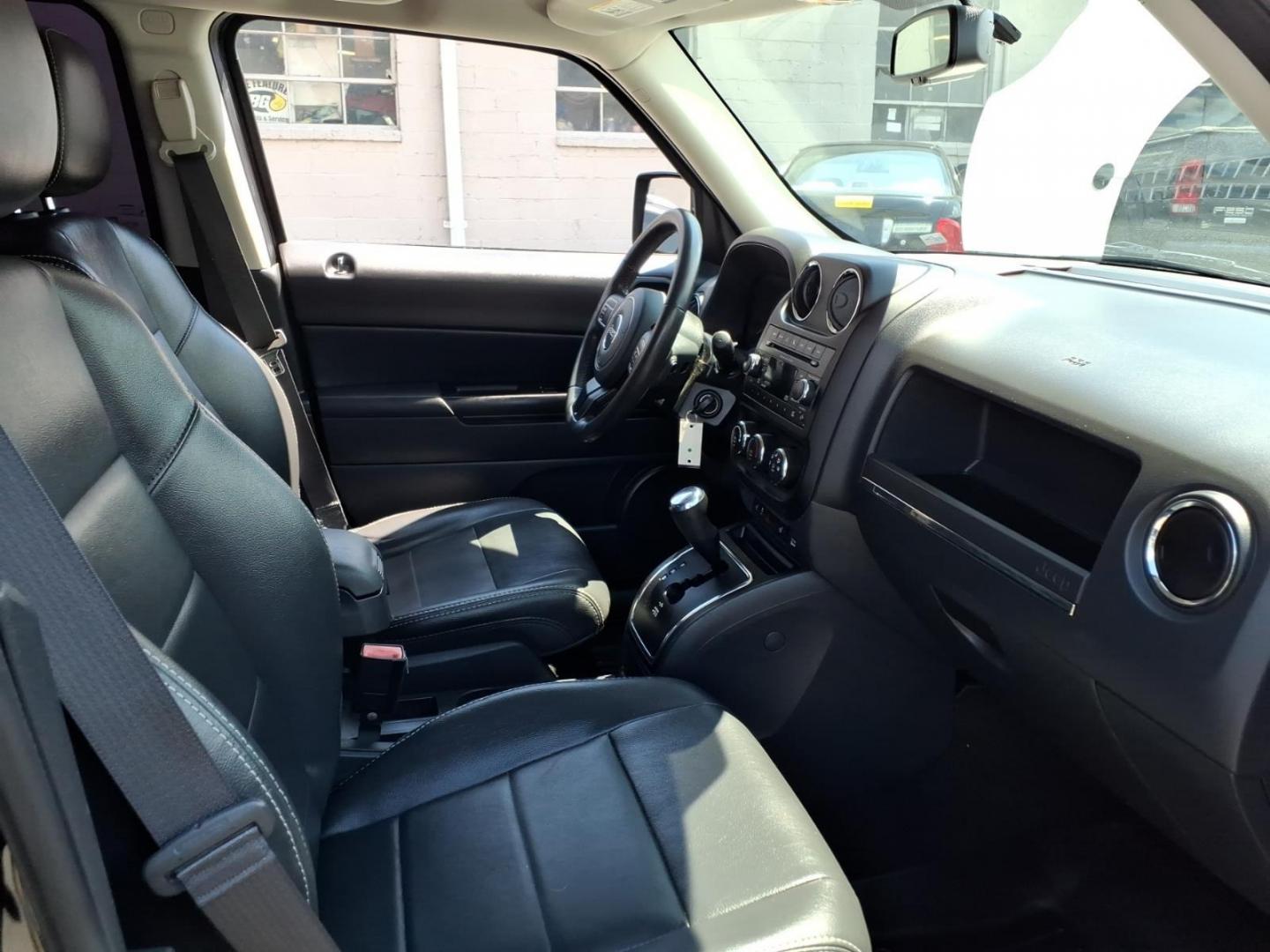2016 Black Jeep Patriot High Altitude (1C4NJPFA0GD) with an 2.0L 4 Cylinder Sequential-Port F.I. engine, Automatic transmission, located at 50 Eastern Blvd., Essex, MD, 21221, (410) 686-3444, 39.304367, -76.484947- Photo#11