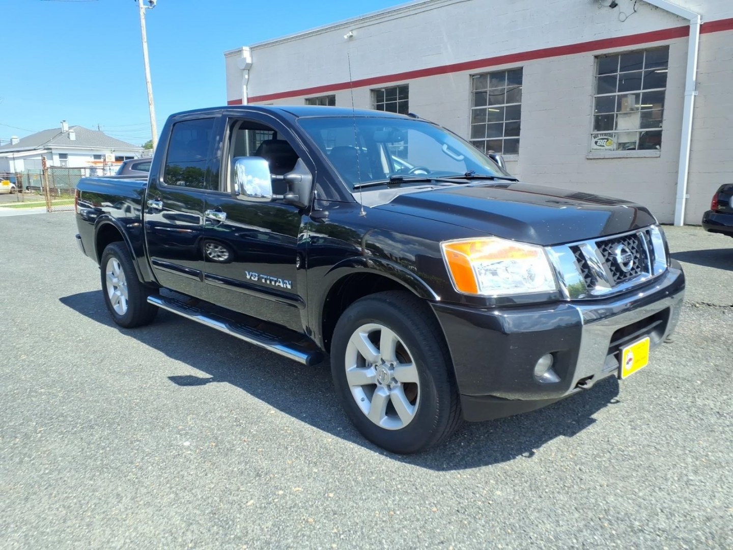 2014 Black Nissan Titan SL (1N6AA0EC6EN) with an 5.6L 8 Cylinder Fuel Injected engine, AT4X4 transmission, located at 50 Eastern Blvd., Essex, MD, 21221, (410) 686-3444, 39.304367, -76.484947- Photo#5