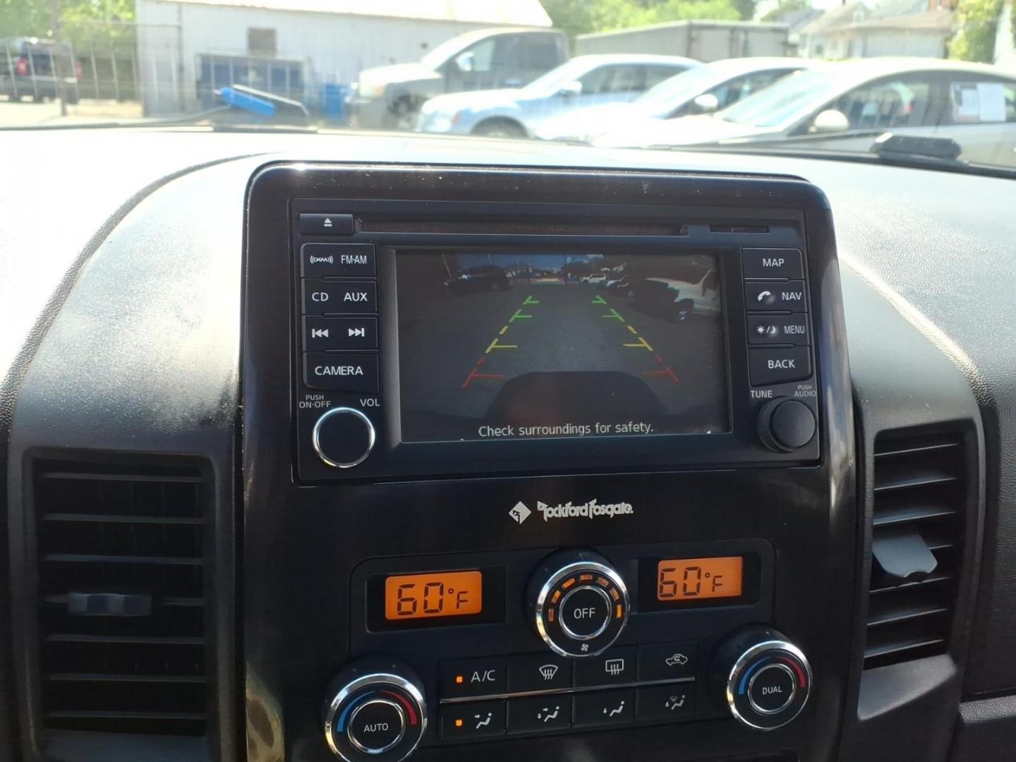 2014 Black Nissan Titan SL (1N6AA0EC6EN) with an 5.6L 8 Cylinder Fuel Injected engine, AT4X4 transmission, located at 50 Eastern Blvd., Essex, MD, 21221, (410) 686-3444, 39.304367, -76.484947- Photo#15
