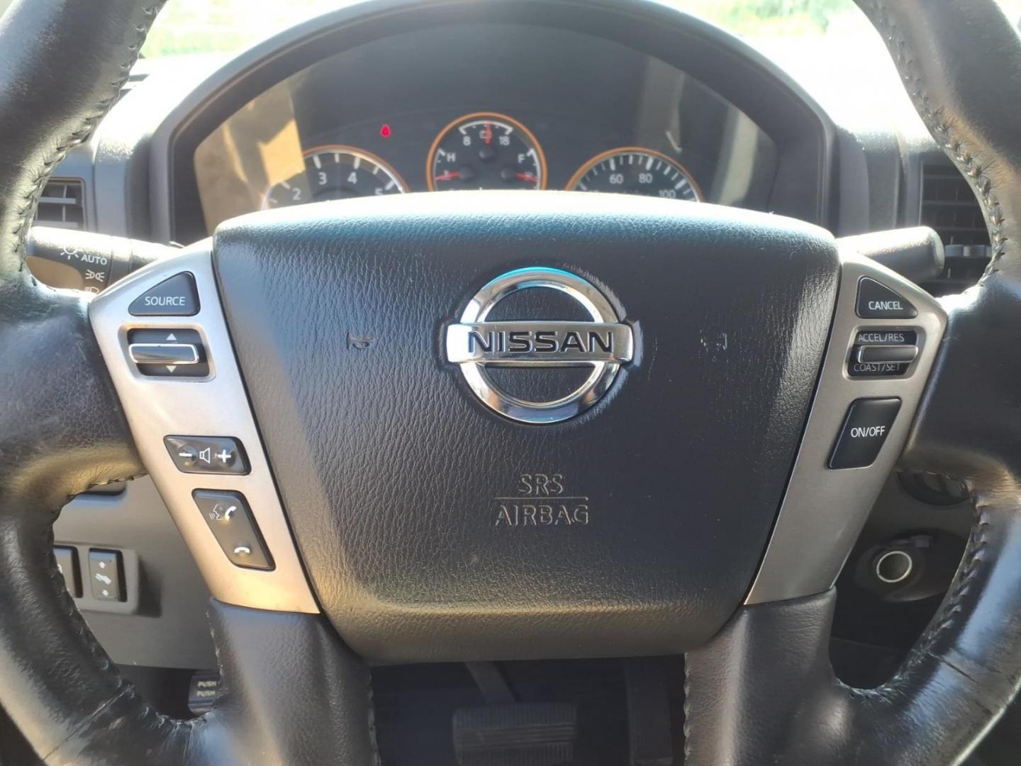 2014 Black Nissan Titan SL (1N6AA0EC6EN) with an 5.6L 8 Cylinder Fuel Injected engine, AT4X4 transmission, located at 50 Eastern Blvd., Essex, MD, 21221, (410) 686-3444, 39.304367, -76.484947- Photo#17