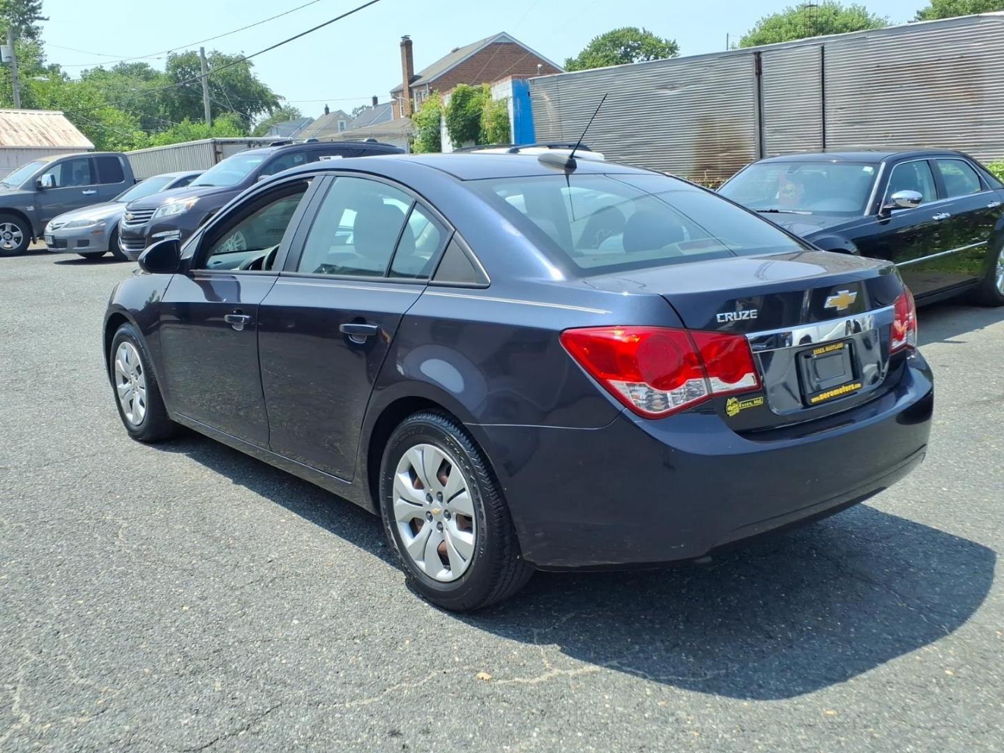 2015 Blue Chevrolet Cruze LS Auto (1G1PA5SG5F7) with an 1.8L 4 Cylinder Sequential-Port F.I. engine, Automatic transmission, located at 50 Eastern Blvd., Essex, MD, 21221, (410) 686-3444, 39.304367, -76.484947- Photo#2