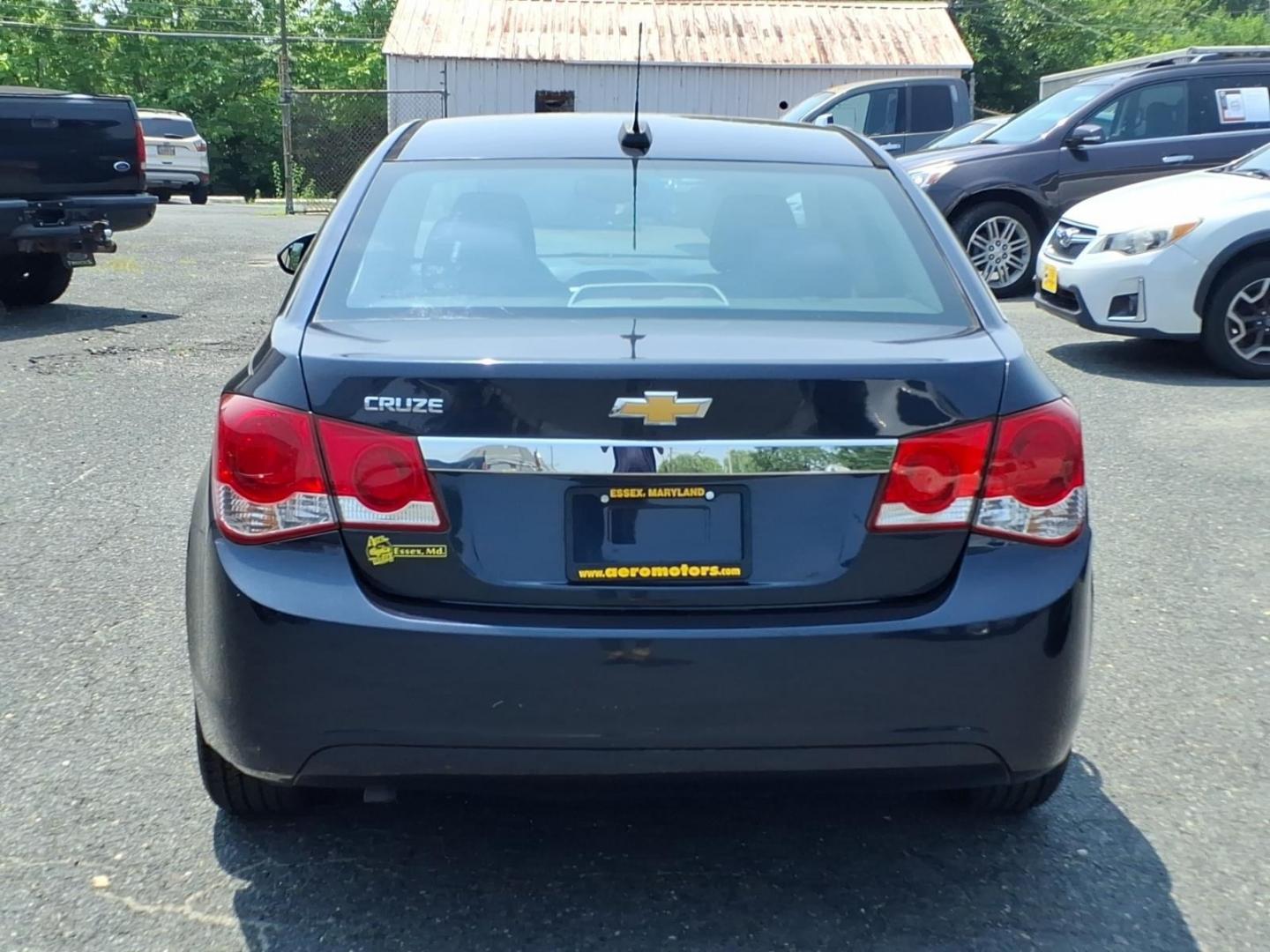 2015 Blue Chevrolet Cruze LS Auto (1G1PA5SG5F7) with an 1.8L 4 Cylinder Sequential-Port F.I. engine, Automatic transmission, located at 50 Eastern Blvd., Essex, MD, 21221, (410) 686-3444, 39.304367, -76.484947- Photo#3