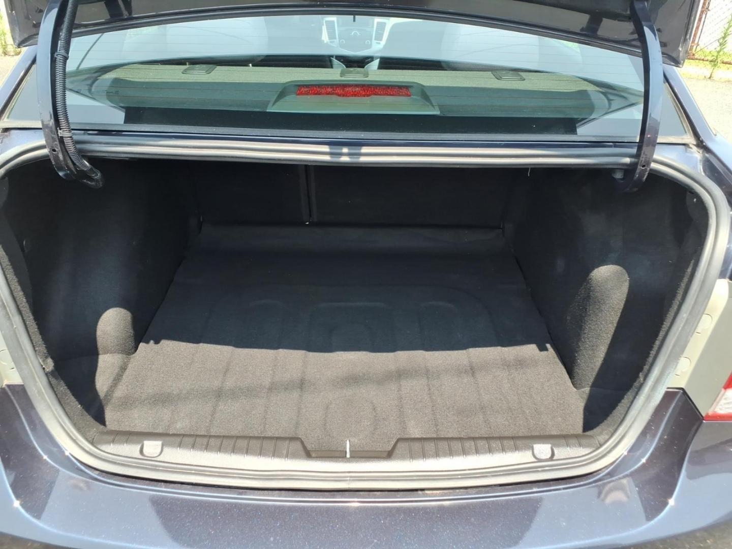 2015 Blue Chevrolet Cruze LS Auto (1G1PA5SG5F7) with an 1.8L 4 Cylinder Sequential-Port F.I. engine, Automatic transmission, located at 50 Eastern Blvd., Essex, MD, 21221, (410) 686-3444, 39.304367, -76.484947- Photo#11