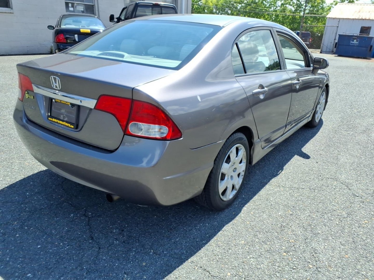 2009 Polished Metal Metallic Honda Civic LX (1HGFA16529L) with an 1.8L 4 Cylinder Fuel Injected engine, Automatic transmission, located at 50 Eastern Blvd., Essex, MD, 21221, (410) 686-3444, 39.304367, -76.484947- Photo#3
