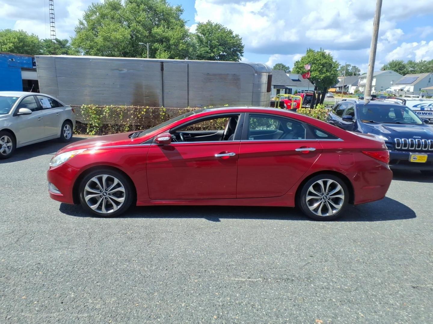 2014 Venetian Red Hyundai SONATA Limited 2.0T (5NPEC4AB5EH) with an 2.0L 4 Cylinder Turbocharged engine, Automatic transmission, located at 50 Eastern Blvd., Essex, MD, 21221, (410) 686-3444, 39.304367, -76.484947- Photo#1