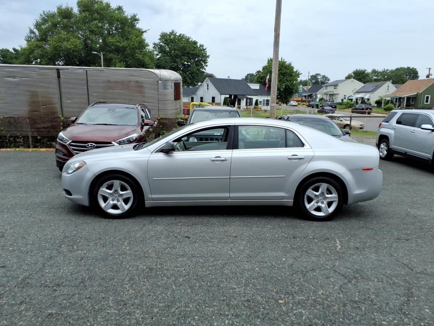 2011 Silver Chevrolet Malibu LS (1G1ZB5E10BF) with an 2.4L 4 Cylinder Sequential-Port F.I. engine, Automatic transmission, located at 50 Eastern Blvd., Essex, MD, 21221, (410) 686-3444, 39.304367, -76.484947- Photo#1