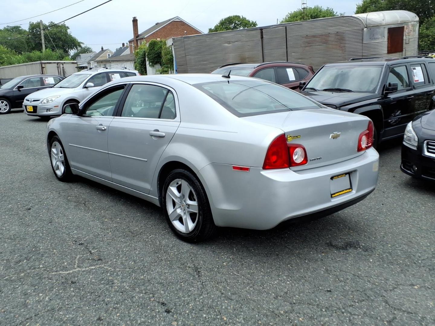 2011 Silver Chevrolet Malibu LS (1G1ZB5E10BF) with an 2.4L 4 Cylinder Sequential-Port F.I. engine, Automatic transmission, located at 50 Eastern Blvd., Essex, MD, 21221, (410) 686-3444, 39.304367, -76.484947- Photo#2