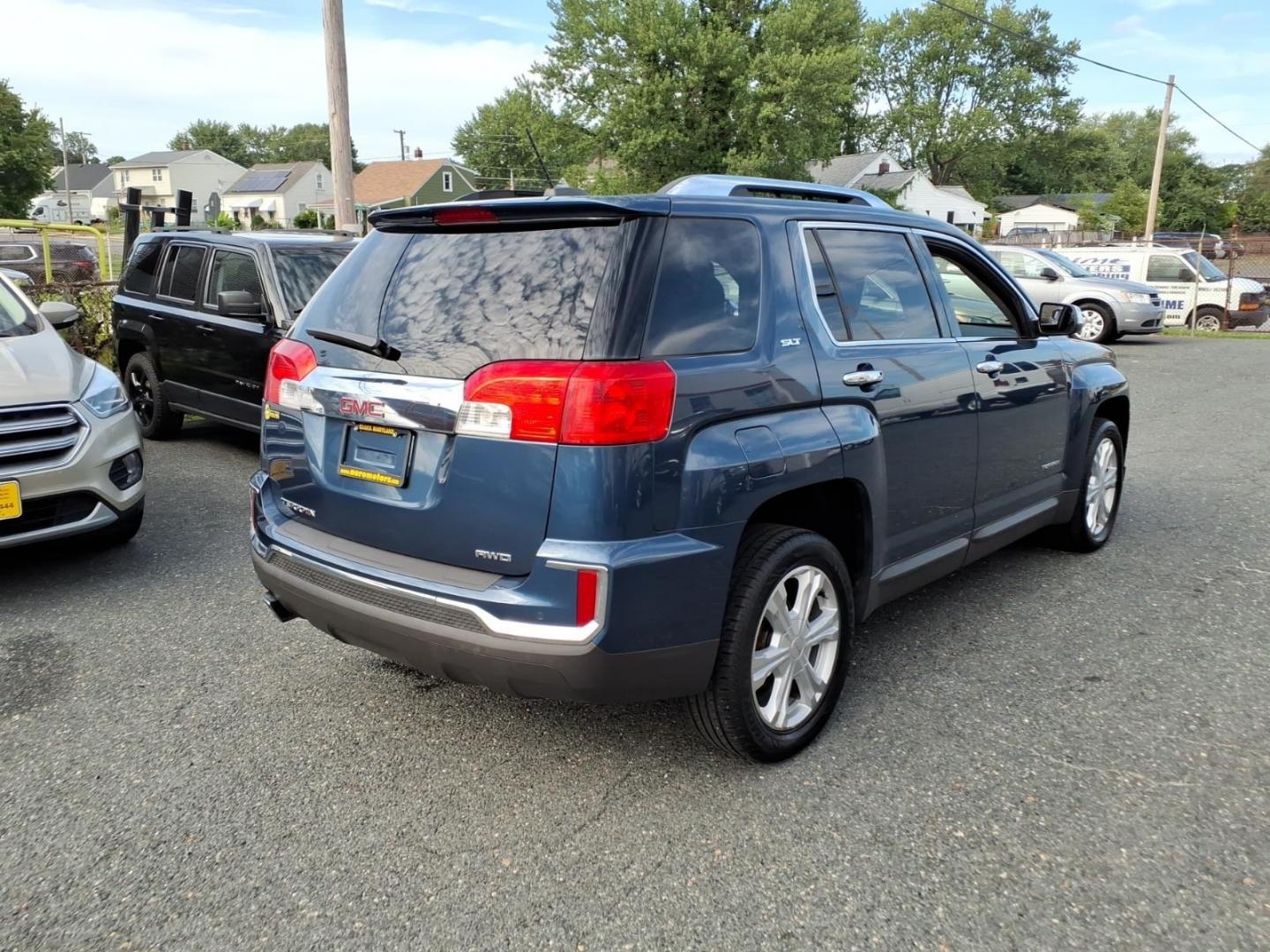 2016 Dark Sapphire Blue Metallic GMC Terrain SLT (2GKFLUEK6G6) with an 2.4L 4 Cylinder Fuel Injected engine, ATAWD transmission, located at 50 Eastern Blvd., Essex, MD, 21221, (410) 686-3444, 39.304367, -76.484947- Photo#4