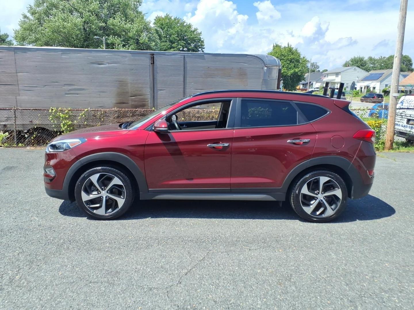 2016 Red Hyundai TUCSON Limited (KM8J3CA26GU) with an 1.6L 4 Cylinder Turbocharged engine, ATAWD transmission, located at 50 Eastern Blvd., Essex, MD, 21221, (410) 686-3444, 39.304367, -76.484947- Photo#1
