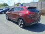 2016 Red Hyundai TUCSON Limited (KM8J3CA26GU) with an 1.6L 4 Cylinder Turbocharged engine, ATAWD transmission, located at 50 Eastern Blvd., Essex, MD, 21221, (410) 686-3444, 39.304367, -76.484947- Photo#2