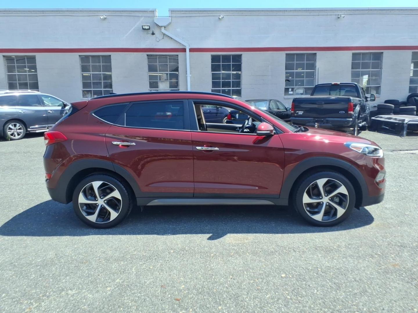 2016 Red Hyundai TUCSON Limited (KM8J3CA26GU) with an 1.6L 4 Cylinder Turbocharged engine, ATAWD transmission, located at 50 Eastern Blvd., Essex, MD, 21221, (410) 686-3444, 39.304367, -76.484947- Photo#4