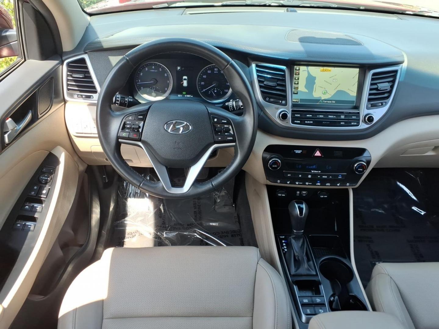 2016 Red Hyundai TUCSON Limited (KM8J3CA26GU) with an 1.6L 4 Cylinder Turbocharged engine, ATAWD transmission, located at 50 Eastern Blvd., Essex, MD, 21221, (410) 686-3444, 39.304367, -76.484947- Photo#13