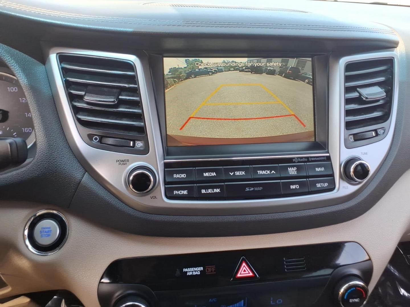 2016 Red Hyundai TUCSON Limited (KM8J3CA26GU) with an 1.6L 4 Cylinder Turbocharged engine, ATAWD transmission, located at 50 Eastern Blvd., Essex, MD, 21221, (410) 686-3444, 39.304367, -76.484947- Photo#16