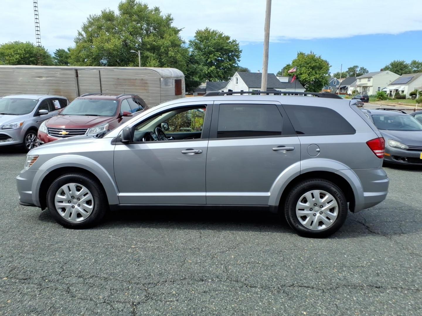 2018 Silver Dodge Journey SE (3C4PDCAB9JT) with an 2.4L 4 Cylinder Sequential-Port F.I. engine, Automatic transmission, located at 50 Eastern Blvd., Essex, MD, 21221, (410) 686-3444, 39.304367, -76.484947- Photo#1
