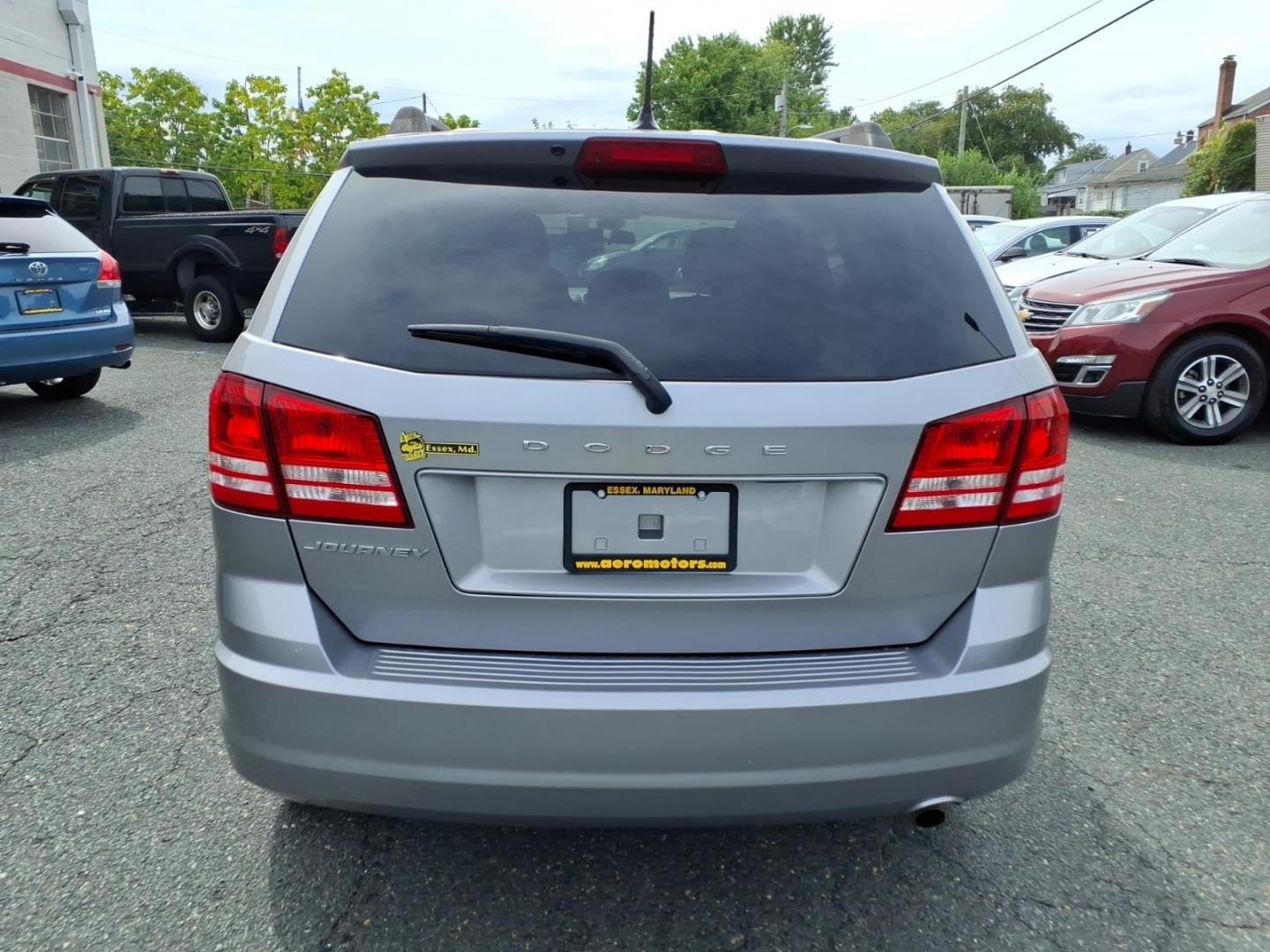 2018 Silver Dodge Journey SE (3C4PDCAB9JT) with an 2.4L 4 Cylinder Sequential-Port F.I. engine, Automatic transmission, located at 50 Eastern Blvd., Essex, MD, 21221, (410) 686-3444, 39.304367, -76.484947- Photo#3