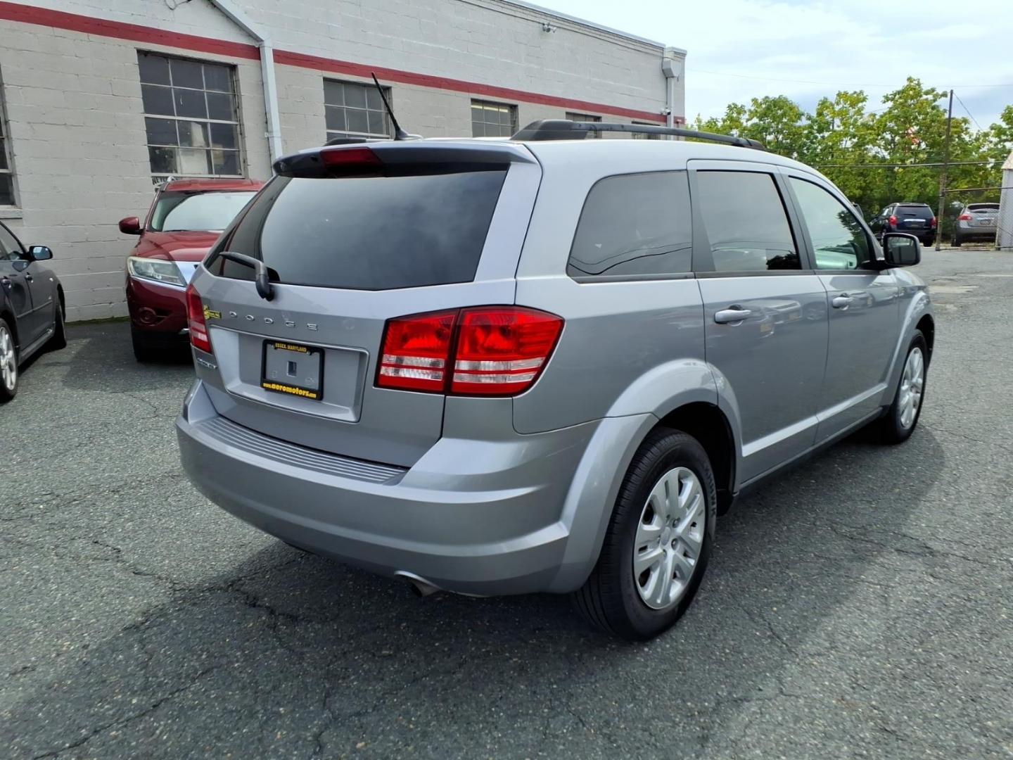 2018 Silver Dodge Journey SE (3C4PDCAB9JT) with an 2.4L 4 Cylinder Sequential-Port F.I. engine, Automatic transmission, located at 50 Eastern Blvd., Essex, MD, 21221, (410) 686-3444, 39.304367, -76.484947- Photo#4