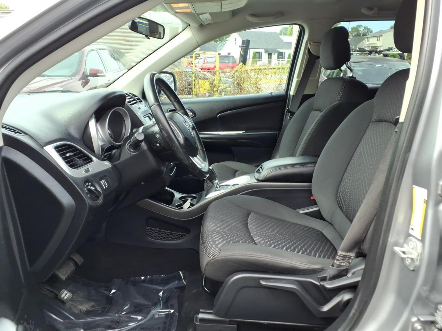 2018 Silver Dodge Journey SE (3C4PDCAB9JT) with an 2.4L 4 Cylinder Sequential-Port F.I. engine, Automatic transmission, located at 50 Eastern Blvd., Essex, MD, 21221, (410) 686-3444, 39.304367, -76.484947- Photo#6