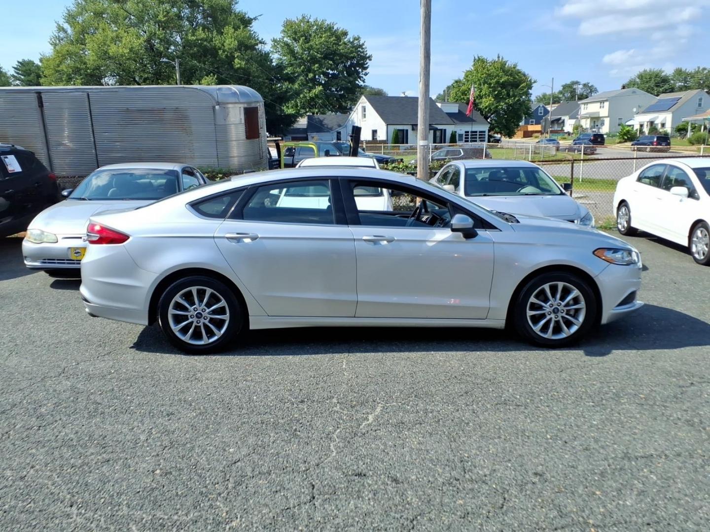 2017 Ingot Silver Ford Fusion SE (3FA6P0H72HR) with an 2.5L 4 Cylinder Sequential-Port F.I. engine, Automatic transmission, located at 50 Eastern Blvd., Essex, MD, 21221, (410) 686-3444, 39.304367, -76.484947- Photo#5