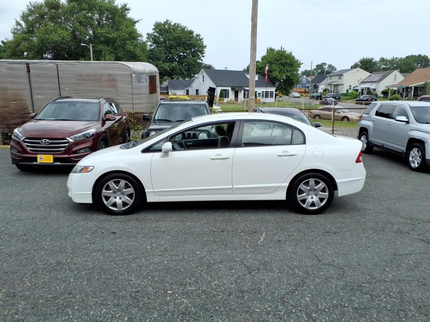 2010 White Honda Civic LX (2HGFA1F50AH) with an 1.8L 4 Cylinder Fuel Injected engine, Automatic transmission, located at 50 Eastern Blvd., Essex, MD, 21221, (410) 686-3444, 39.304367, -76.484947- Photo#1