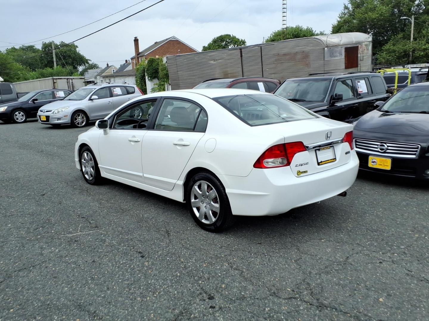 2010 White Honda Civic LX (2HGFA1F50AH) with an 1.8L 4 Cylinder Fuel Injected engine, Automatic transmission, located at 50 Eastern Blvd., Essex, MD, 21221, (410) 686-3444, 39.304367, -76.484947- Photo#2