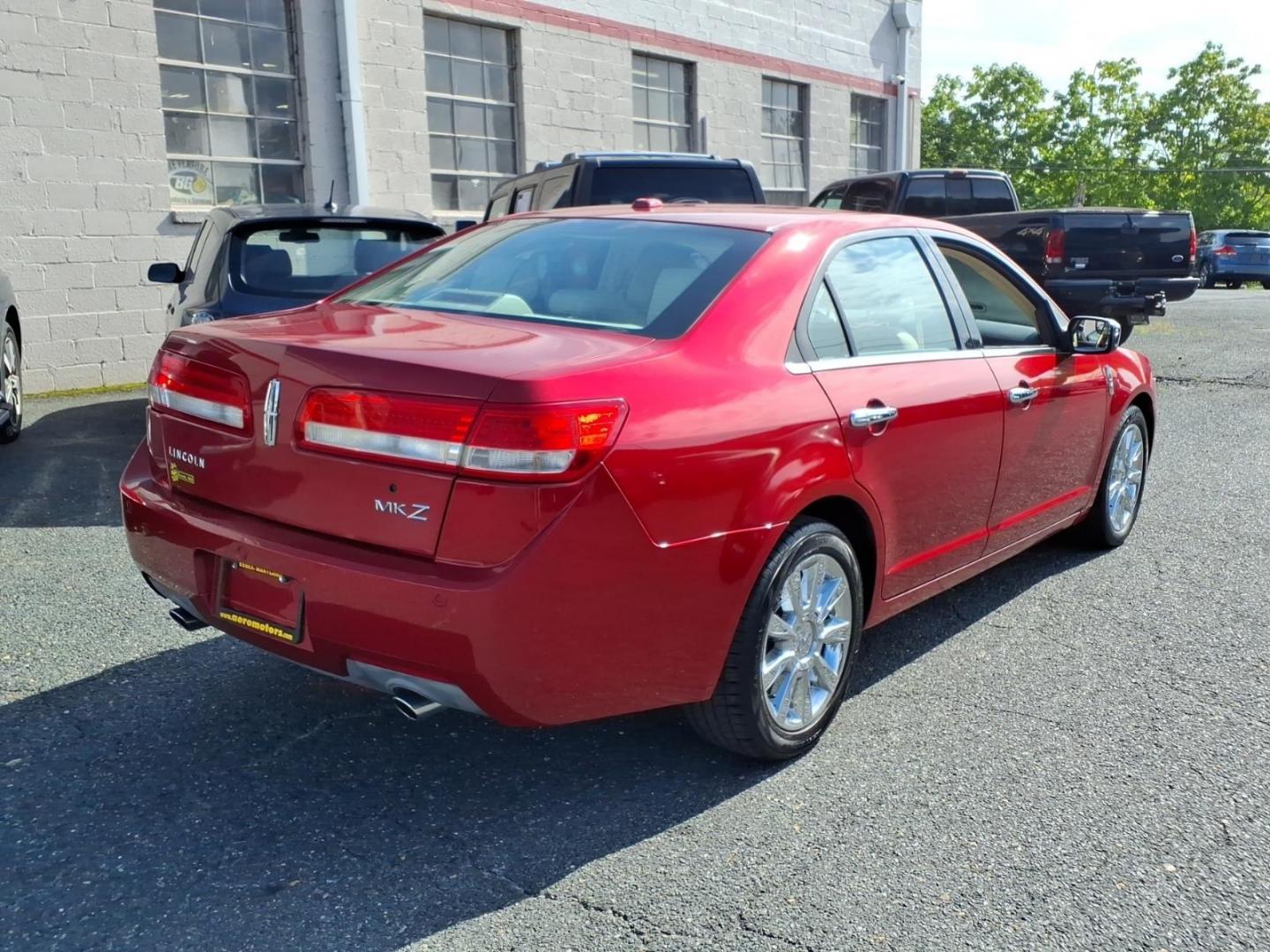 2011 Red Lincoln MKZ Base (3LNHL2GC9BR) with an 3.5L 6 Cylinder Sequential-Port F.I. engine, ATV6 transmission, located at 50 Eastern Blvd., Essex, MD, 21221, (410) 686-3444, 39.304367, -76.484947- Photo#3