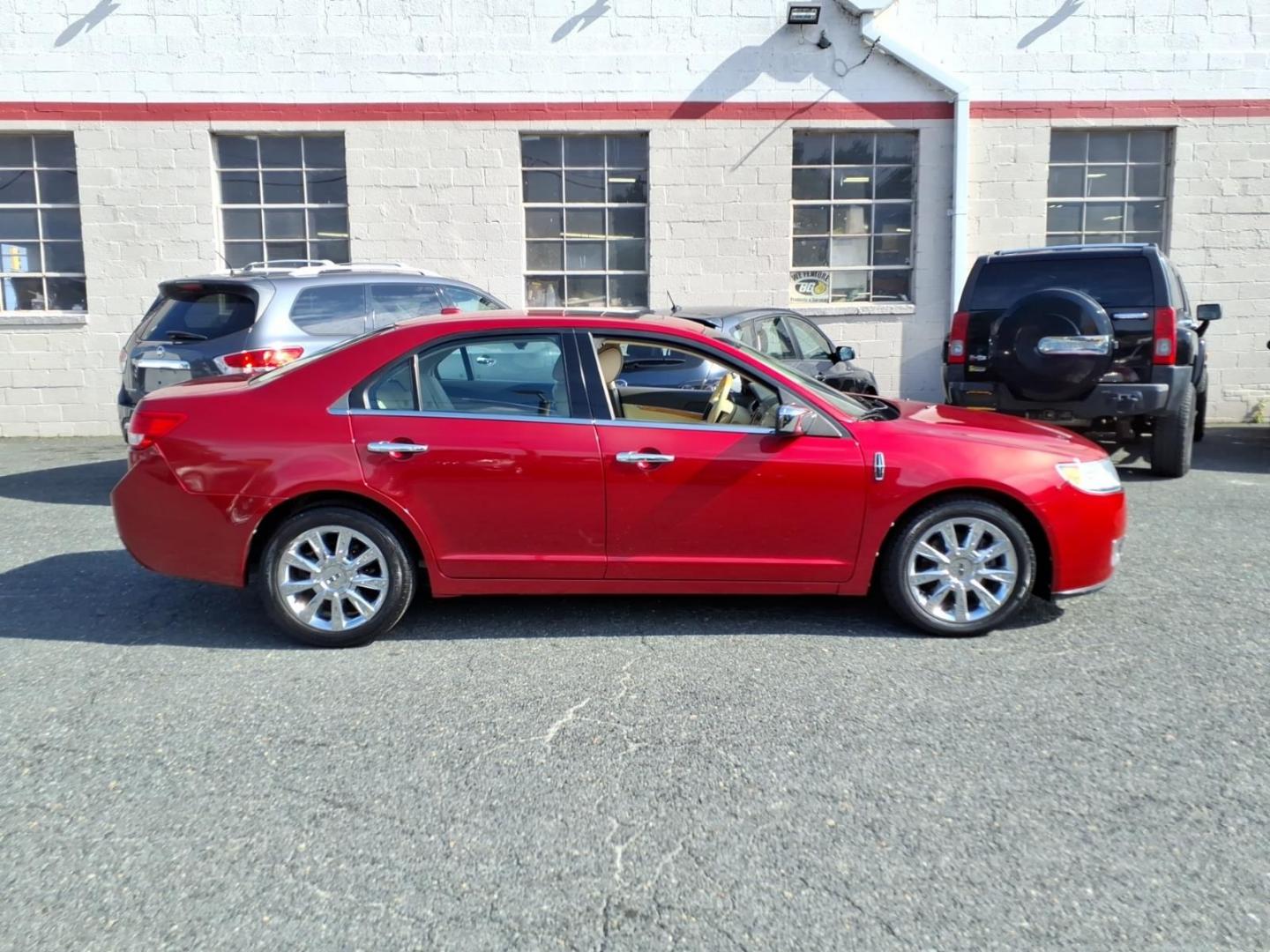 2011 Red Lincoln MKZ Base (3LNHL2GC9BR) with an 3.5L 6 Cylinder Sequential-Port F.I. engine, ATV6 transmission, located at 50 Eastern Blvd., Essex, MD, 21221, (410) 686-3444, 39.304367, -76.484947- Photo#4