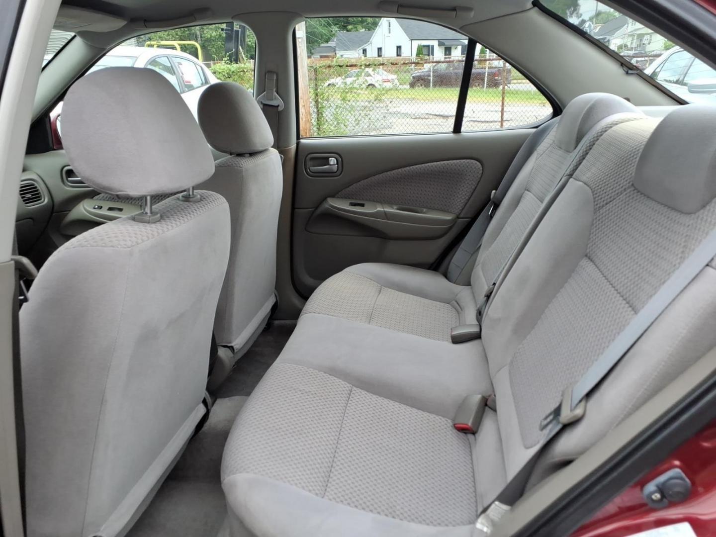 2005 Code Red Nissan Sentra 1.8 S (3N1CB51D55L) with an 1.8L 1L NA I4 double overhead cam (DOHC) 16V Fuel Injected engine, 4-Speed Automatic transmission, located at 50 Eastern Blvd., Essex, MD, 21221, (410) 686-3444, 39.304367, -76.484947- Photo#11