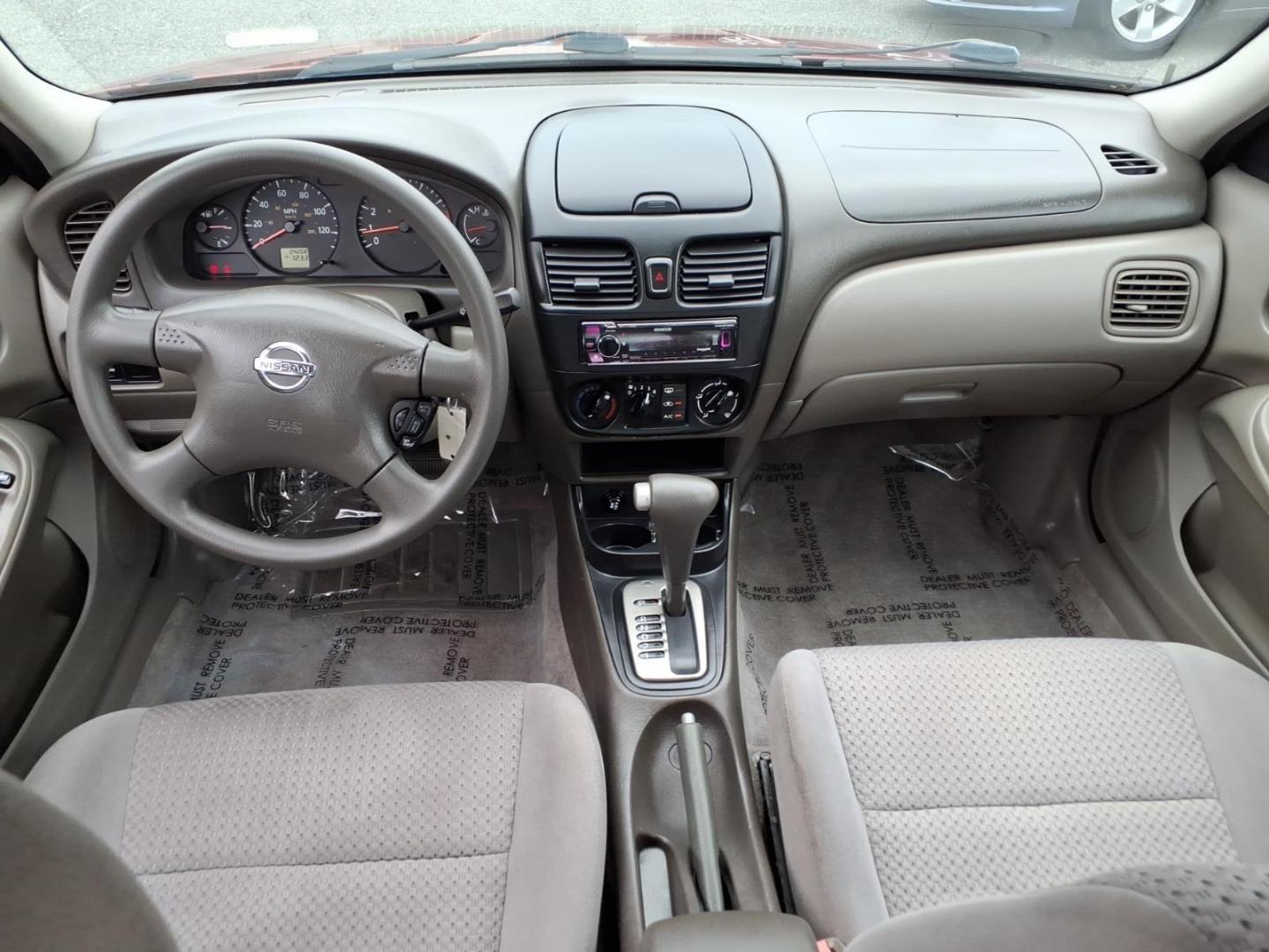 2005 Code Red Nissan Sentra 1.8 S (3N1CB51D55L) with an 1.8L 1L NA I4 double overhead cam (DOHC) 16V Fuel Injected engine, 4-Speed Automatic transmission, located at 50 Eastern Blvd., Essex, MD, 21221, (410) 686-3444, 39.304367, -76.484947- Photo#12
