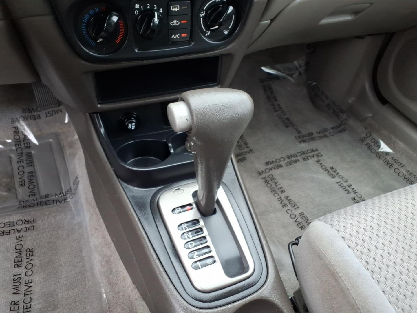 2005 Code Red Nissan Sentra 1.8 S (3N1CB51D55L) with an 1.8L 1L NA I4 double overhead cam (DOHC) 16V Fuel Injected engine, 4-Speed Automatic transmission, located at 50 Eastern Blvd., Essex, MD, 21221, (410) 686-3444, 39.304367, -76.484947- Photo#16