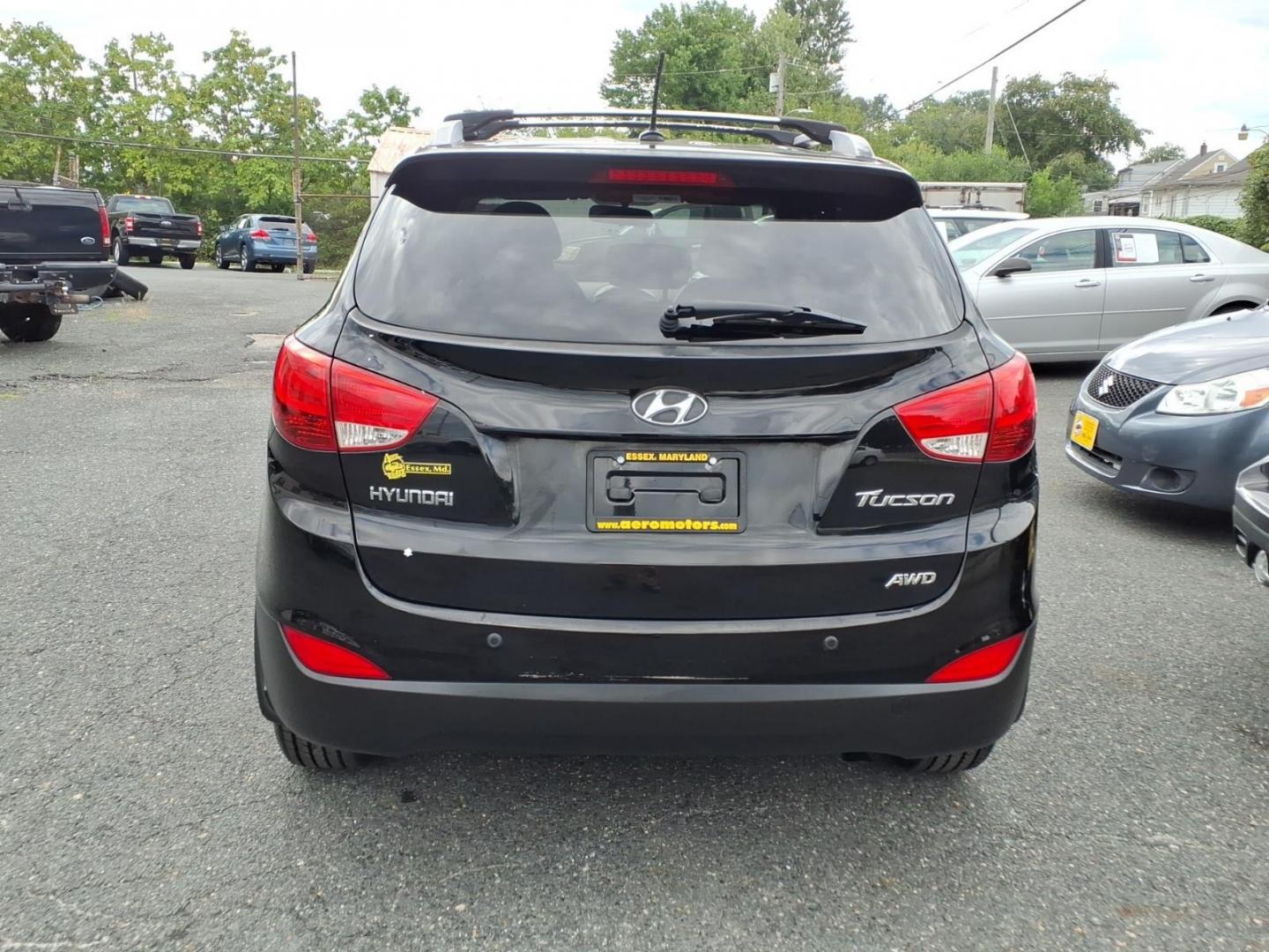 2012 Black Hyundai TUCSON GLS (KM8JUCAC5CU) with an 2.4L 4 Cylinder Sequential-Port F.I. engine, Automatic transmission, located at 50 Eastern Blvd., Essex, MD, 21221, (410) 686-3444, 39.304367, -76.484947- Photo#3