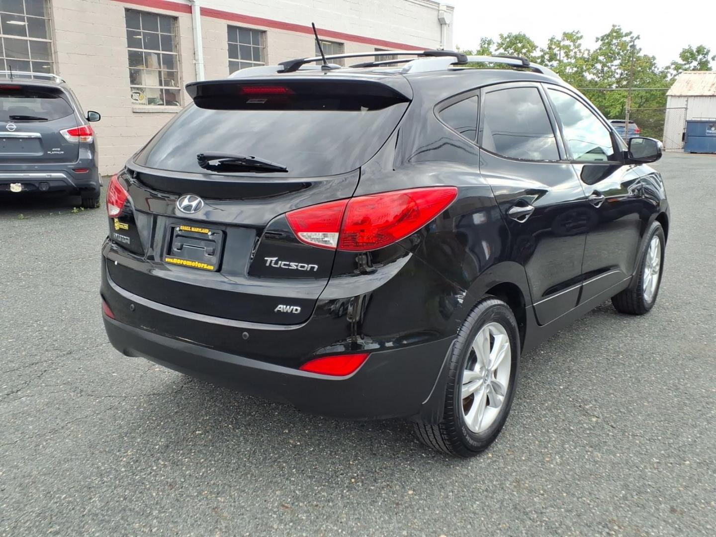 2012 Black Hyundai TUCSON GLS (KM8JUCAC5CU) with an 2.4L 4 Cylinder Sequential-Port F.I. engine, Automatic transmission, located at 50 Eastern Blvd., Essex, MD, 21221, (410) 686-3444, 39.304367, -76.484947- Photo#4