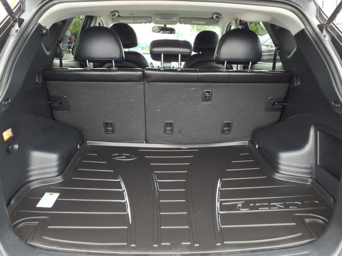 2012 Black Hyundai TUCSON GLS (KM8JUCAC5CU) with an 2.4L 4 Cylinder Sequential-Port F.I. engine, Automatic transmission, located at 50 Eastern Blvd., Essex, MD, 21221, (410) 686-3444, 39.304367, -76.484947- Photo#11