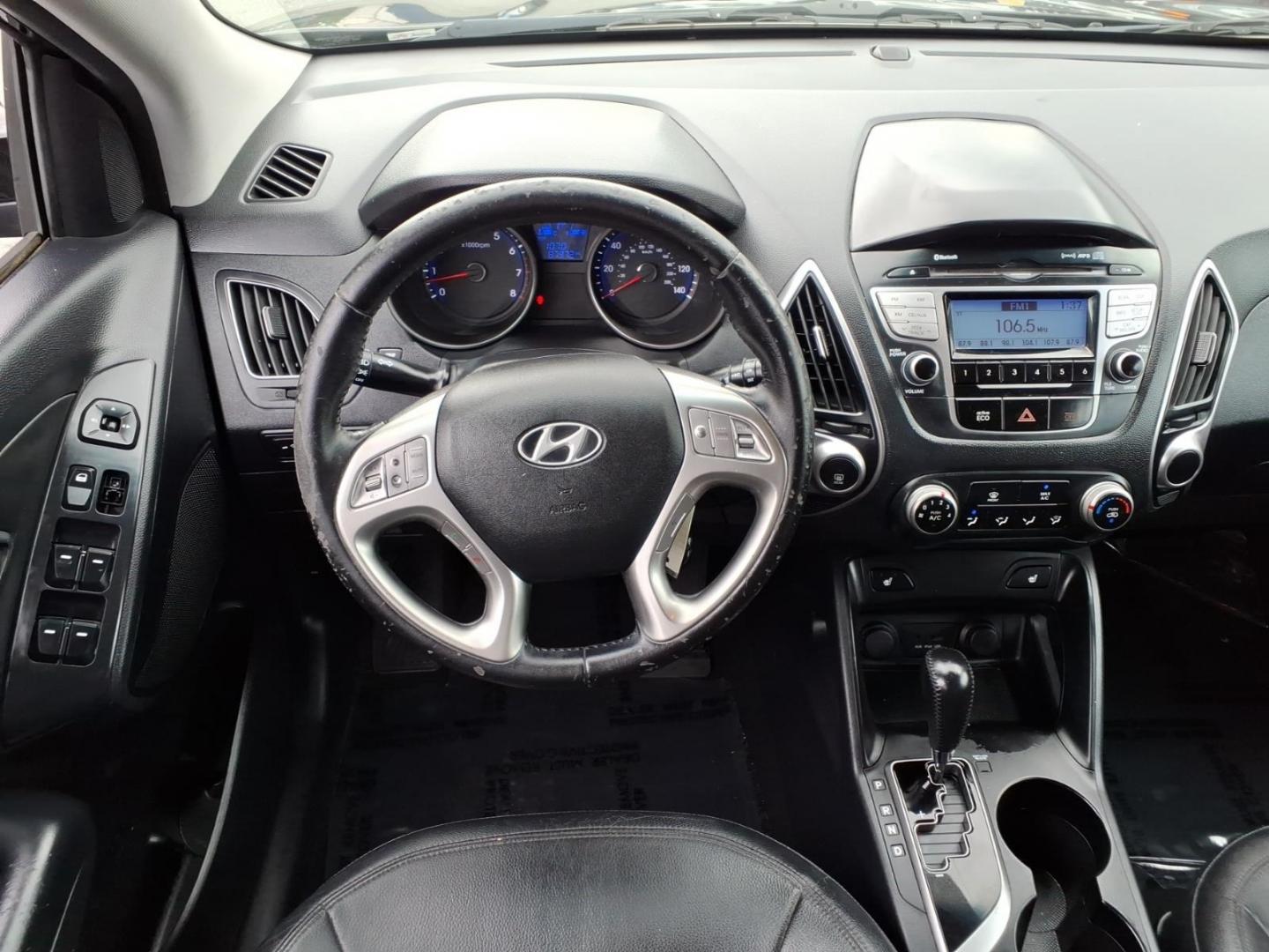 2012 Black Hyundai TUCSON GLS (KM8JUCAC5CU) with an 2.4L 4 Cylinder Sequential-Port F.I. engine, Automatic transmission, located at 50 Eastern Blvd., Essex, MD, 21221, (410) 686-3444, 39.304367, -76.484947- Photo#14