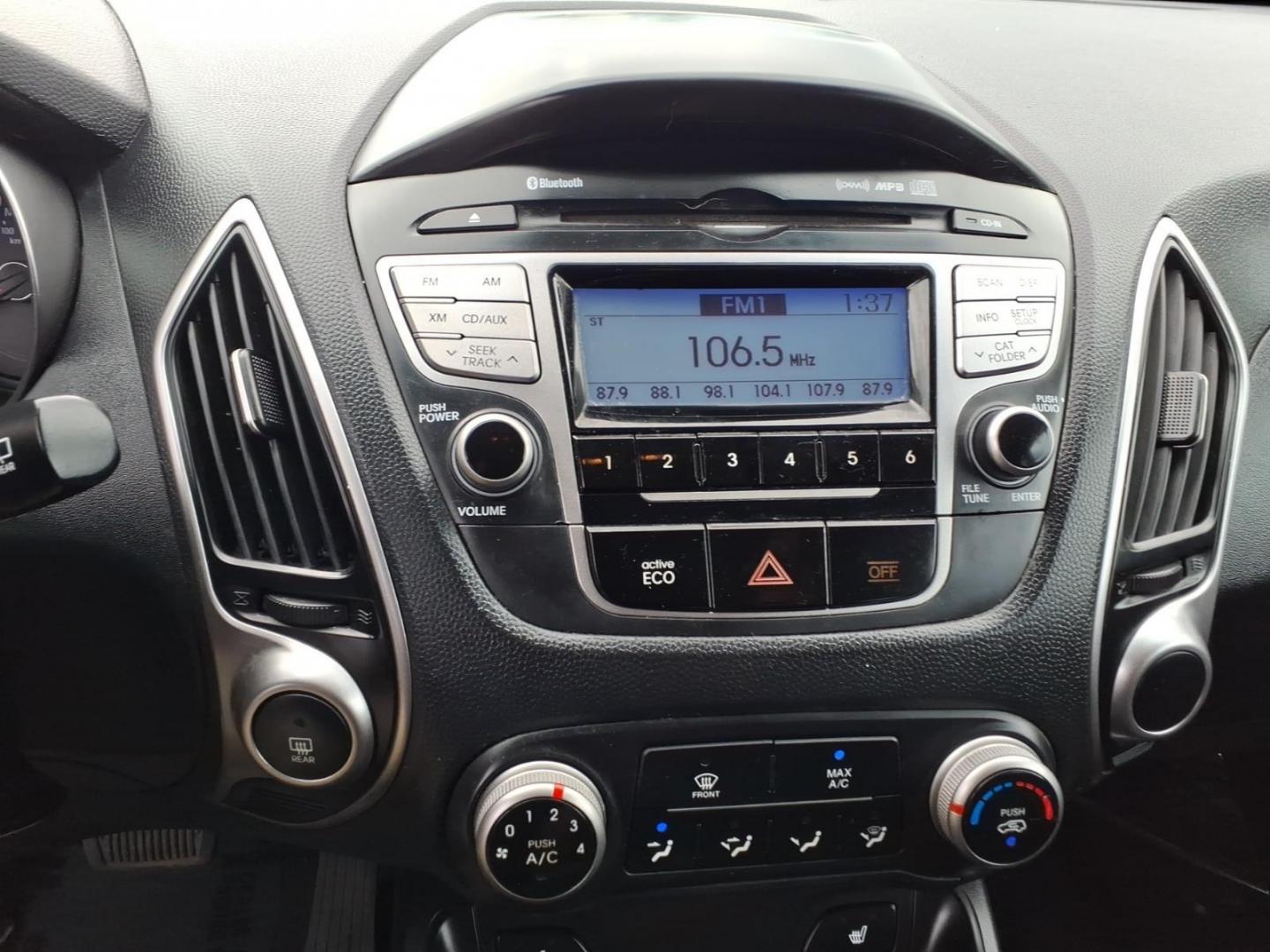 2012 Black Hyundai TUCSON GLS (KM8JUCAC5CU) with an 2.4L 4 Cylinder Sequential-Port F.I. engine, Automatic transmission, located at 50 Eastern Blvd., Essex, MD, 21221, (410) 686-3444, 39.304367, -76.484947- Photo#15