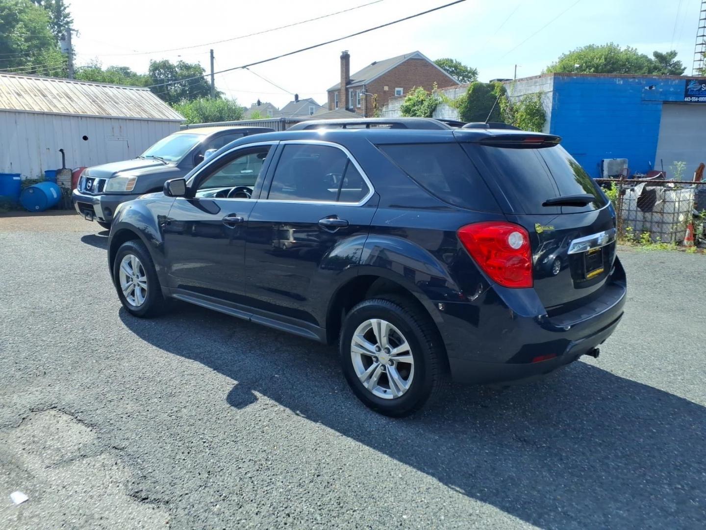 2015 Black Gba Chevrolet Equinox LT (2GNALBEK6F1) with an 2.4L 4 Cylinder Fuel Injected engine, Automatic transmission, located at 50 Eastern Blvd., Essex, MD, 21221, (410) 686-3444, 39.304367, -76.484947- Photo#2