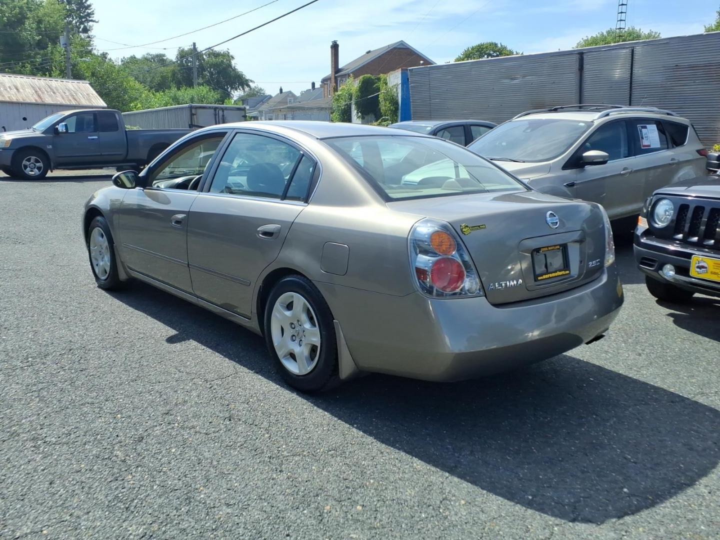 2002 Velvet Beige Nissan Altima 2.5 S (1N4AL11E02C) with an 2.5L 2L NA I4 double overhead cam (DOHC) 16V Fuel Injected engine, Automatic transmission, located at 50 Eastern Blvd., Essex, MD, 21221, (410) 686-3444, 39.304367, -76.484947- Photo#2