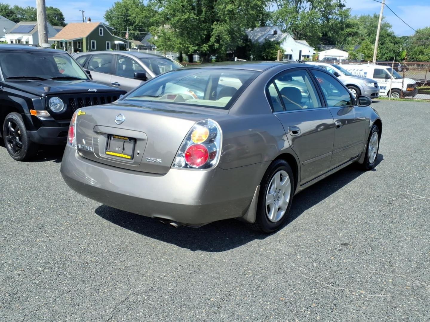 2002 Velvet Beige Nissan Altima 2.5 S (1N4AL11E02C) with an 2.5L 2L NA I4 double overhead cam (DOHC) 16V Fuel Injected engine, Automatic transmission, located at 50 Eastern Blvd., Essex, MD, 21221, (410) 686-3444, 39.304367, -76.484947- Photo#4