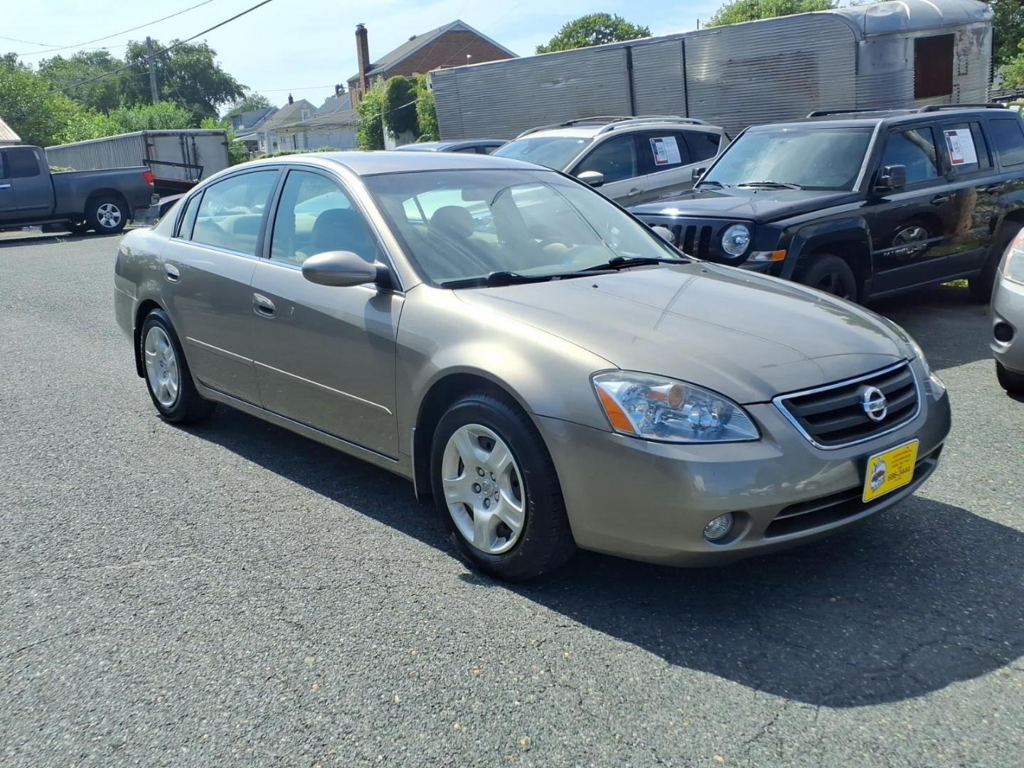 2002 Velvet Beige Nissan Altima 2.5 S (1N4AL11E02C) with an 2.5L 2L NA I4 double overhead cam (DOHC) 16V Fuel Injected engine, Automatic transmission, located at 50 Eastern Blvd., Essex, MD, 21221, (410) 686-3444, 39.304367, -76.484947- Photo#6
