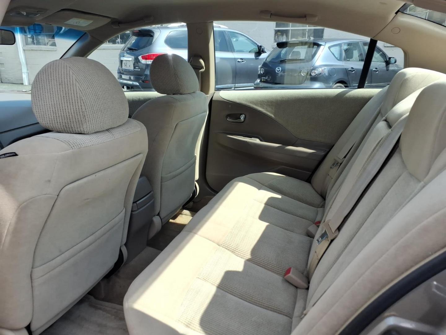2002 Velvet Beige Nissan Altima 2.5 S (1N4AL11E02C) with an 2.5L 2L NA I4 double overhead cam (DOHC) 16V Fuel Injected engine, Automatic transmission, located at 50 Eastern Blvd., Essex, MD, 21221, (410) 686-3444, 39.304367, -76.484947- Photo#12